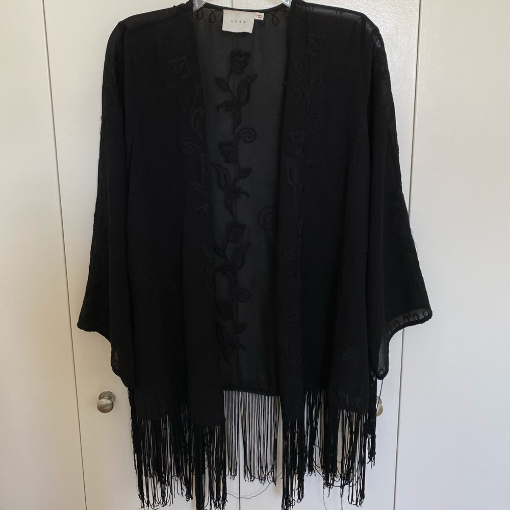 Sophisticated fringe shawl